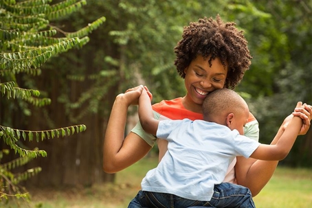 a mom plays with her kid