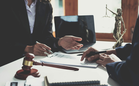 lawyer explaining a document to client